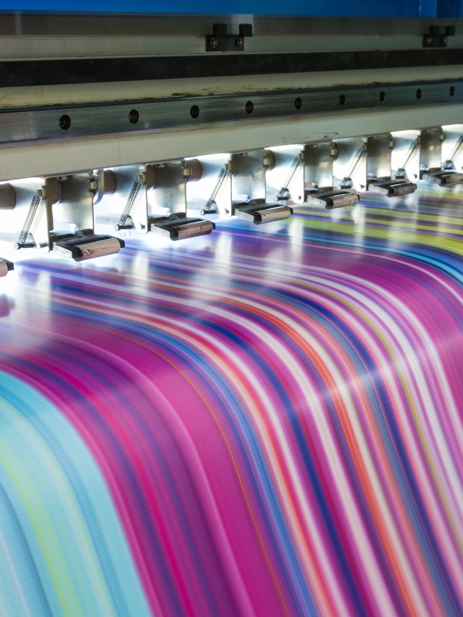 business units polymers printing and packaging printer purple adobestock 182050273